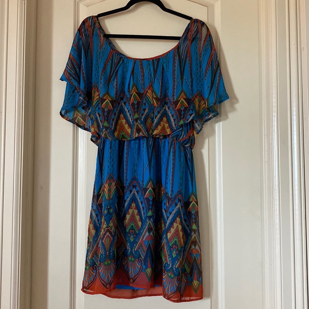 Blue dress with multi color Design.